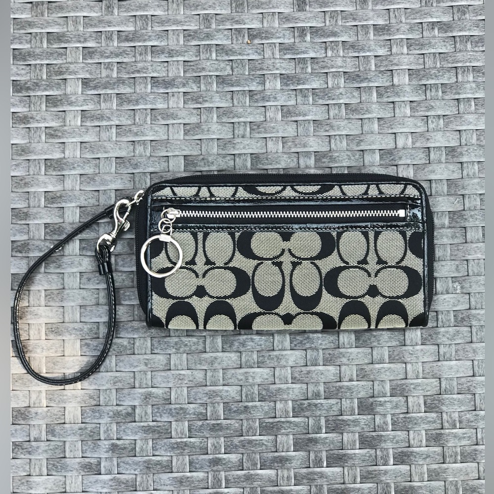Coach wristlet. Zip around. Classic Coach pattern!